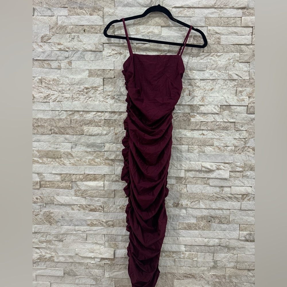 Curve hugging ruched midi dress